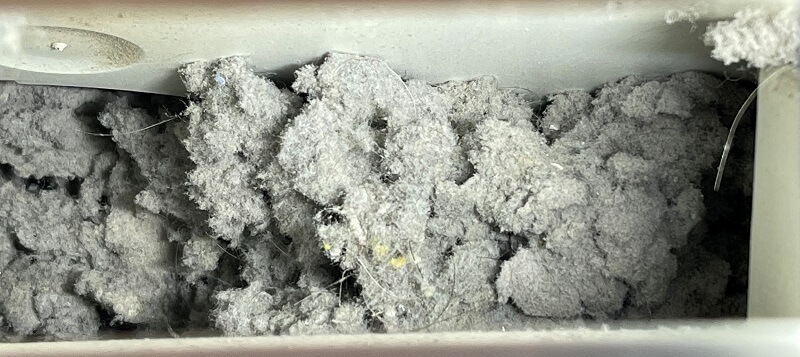 Image of packed dryer lint. Image of packed dryer lint.